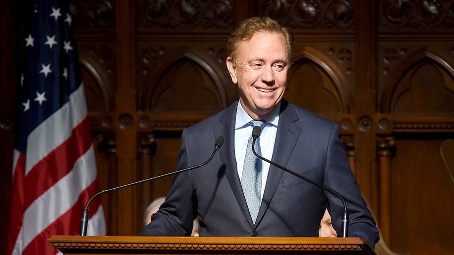 Ned Lamont at a podium speaking