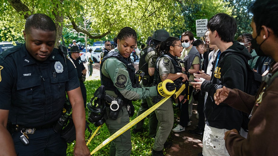 Police put up caution tape at Emory