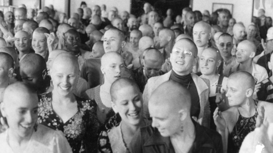 Synanon women shave their head as part of a liberation.