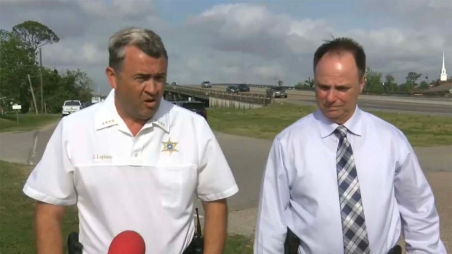 Police talking to media after three police officers were shot in Louisiana