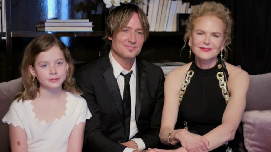 Nicole Kidman, Keith Urban and their daughter Faith at the Golden Globes