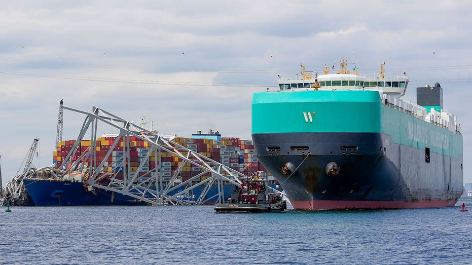 Baltimore port partially reopens, allowing first ship to pass through since bridge collapse