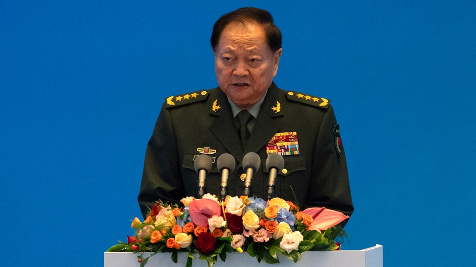 Chinese military leader takes harsh line on Taiwan, other disputes at international naval event