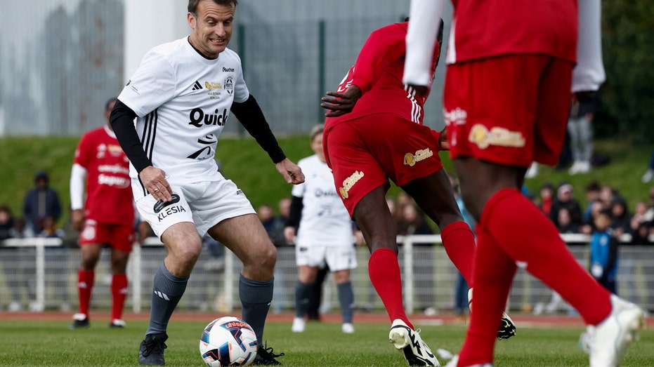 Macron takes part in charity soccer game ahead of Paris Olympics