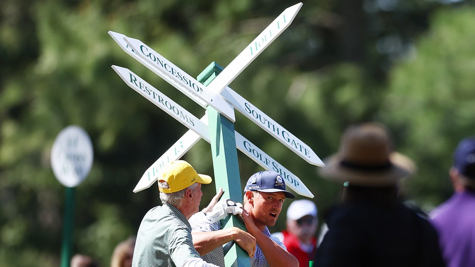 Masters co-leader Bryson DeChambeau rips sign out of ground before shot