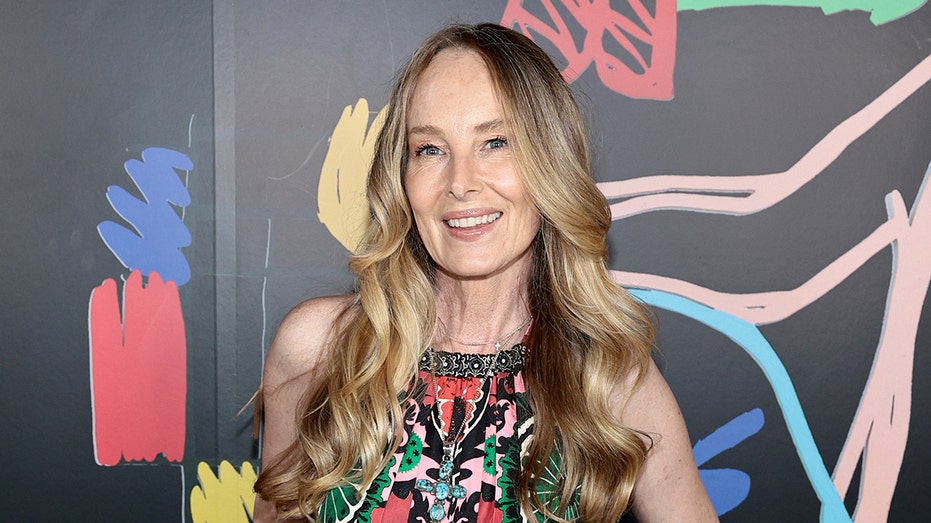 Chynna Phillips says there were 'many curses' during 'painful and traumatic' upbringing