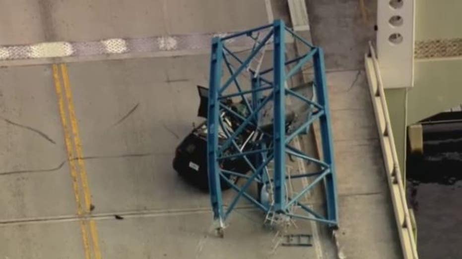 Florida construction crane segment collapses onto downtown bridge killing 1 worker, hospitalizing 2 others