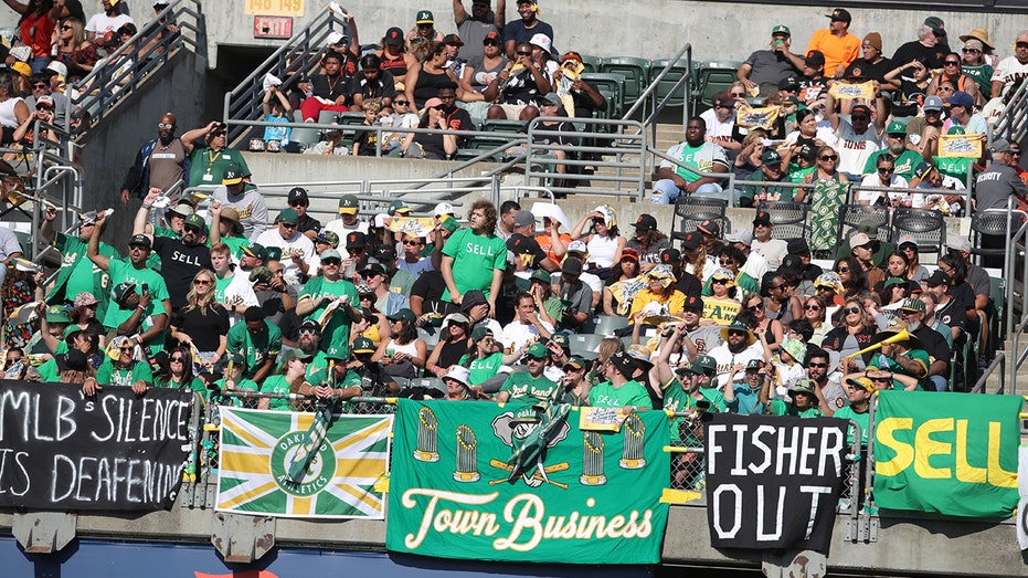 A's fans try to take seats from Oakland Coliseum ahead of team's final game at ballpark thumbnail