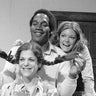 O.J. Simpson poses alongside Gilda Radner’s and Jane Curtin