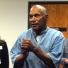 O.J. Simpson reacts after learning he was granted parole at Lovelock Correctional Center 
