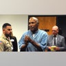 O.J. Simpson reacts after learning he was granted parole at Lovelock Correctional Center 