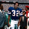 O.J. Simpson is photographed at a football game