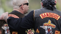 Members of the Bandidos wait in front of the court in Muenster, western Germany, on June 10, 2008. Danish police said Wednesday, May 22, 2024, they are issuing a temporary and immediate ban on the Danish arm of the Bandidos motorcycle club, citing the group&rsquo;s violent behavior.