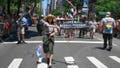NEW YORK, NEW YORK - JUNE 26: Park Rangers for the Stone Wall National Monument and National Park Service march and twirl ribbons during the 2022 New York City Pride march on June 26, 2022 in New York City.