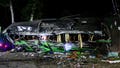 The wreckage of a bus lies on the side of a road following an accident in Subang, West Java, Indonesia, late Saturday, May 11, 2024. The bus carrying high school students and teachers returning from an outing smashed into cars and motorbikes in Indonesia&apos;s West Java province, killing a number of people on board.