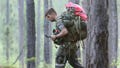 A soldier from the U.S. Army John F. Kennedy Special Warfare Center and School checks a compass while completing a land navigation course during Special Forces Assessment and Selection near Hoffman, N.C., May 7, 2019. U.S. special operations commanders are having to do more with less and they&apos;re learning from the war in Ukraine, That means juggling how to add more high-tech experts to their teams while still cutting their overall forces by about 5,000 troops over the next five years.