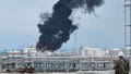 Black smoke billows after an explosion at the gas storage tanks in an industrial area in Rayong province, eastern of Thailand, Thursday, May 9, 2024. At least one person was killed and several others injured after a huge fire broke out at gas storage tanks.