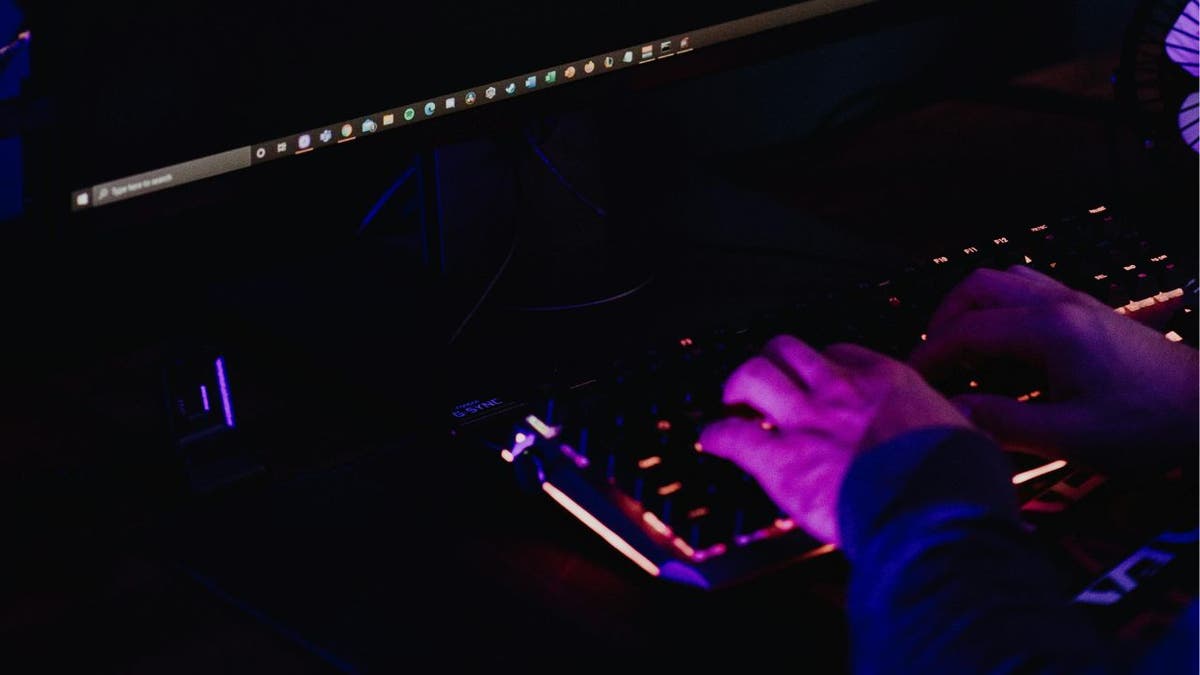 Hacker on keyboard