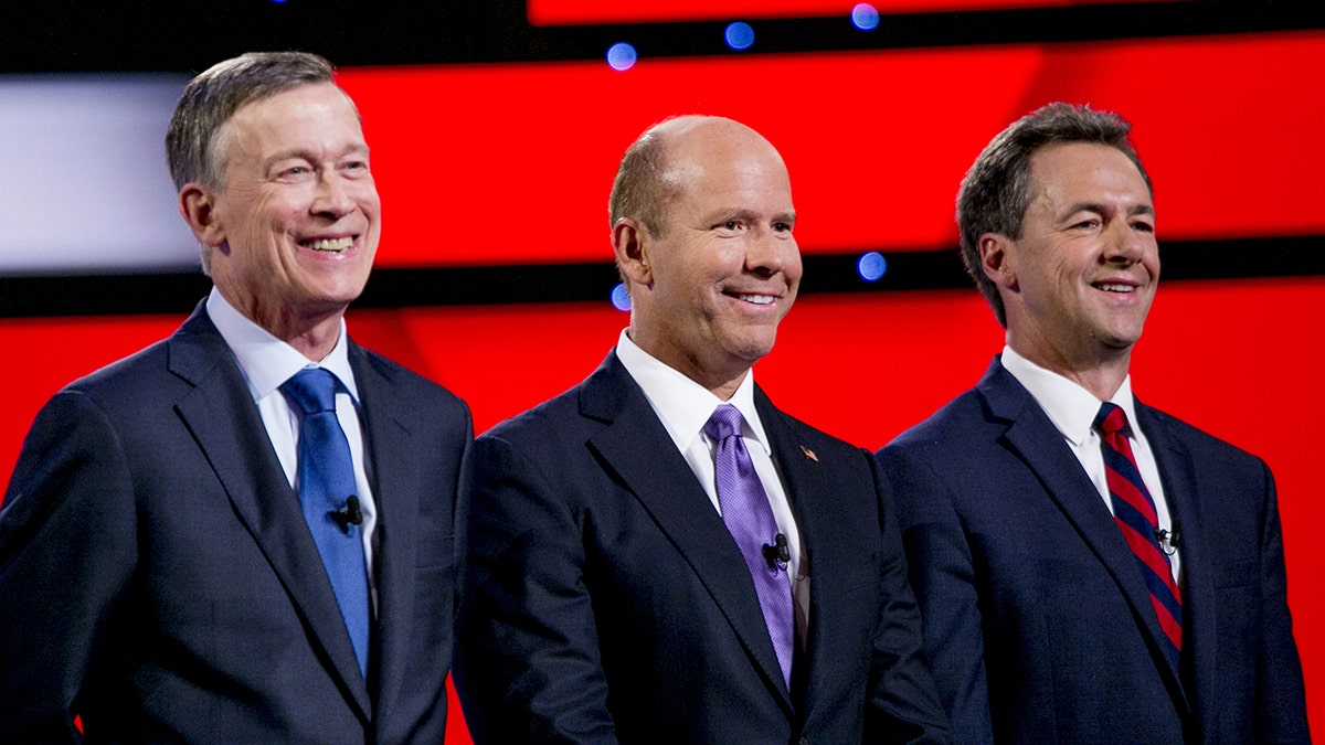 2020 Democratic Presidential Candidates John Hickenlooper, former governor of Colorado, left to right, former Representative John Delaney and Steve Bullock, governor of Montana