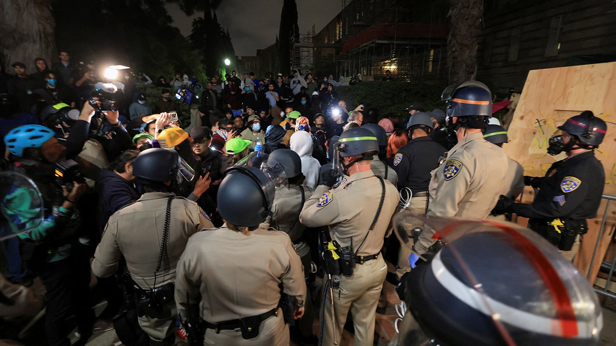 Group of people, police at UCLA
