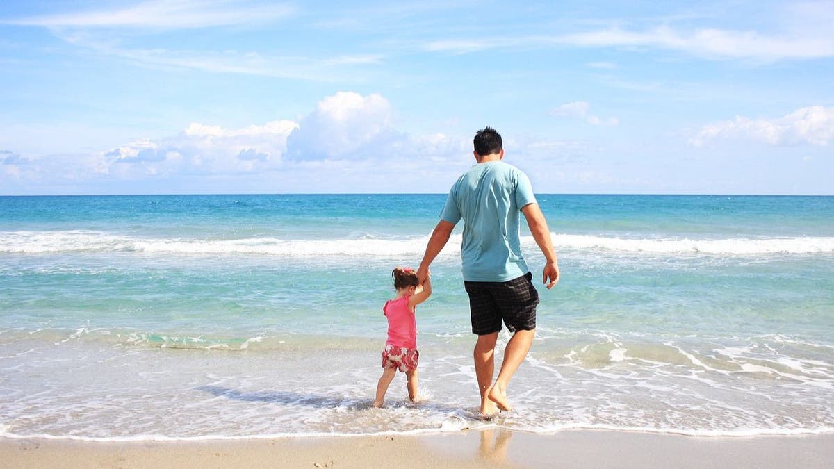 father-daughter at beach