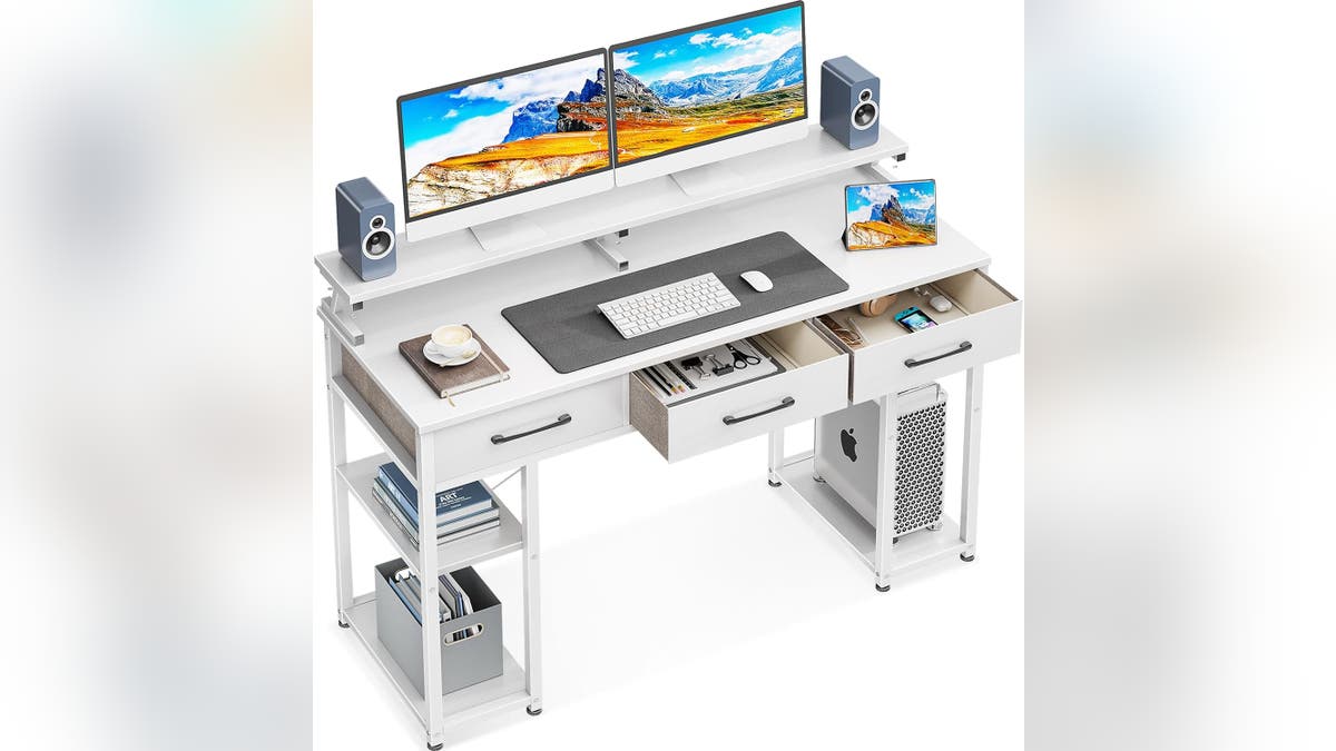 Amazon has a desk that'll fit everything you need for work. 