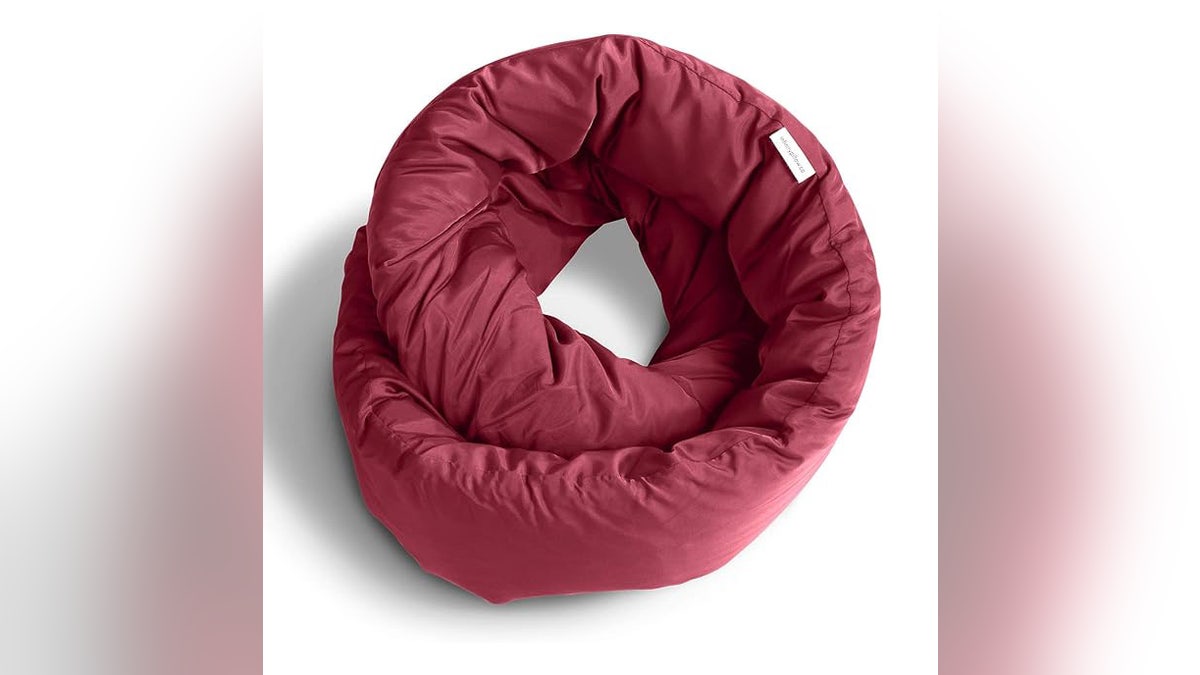 While traveling, a neck pillow keeps you comfortable.