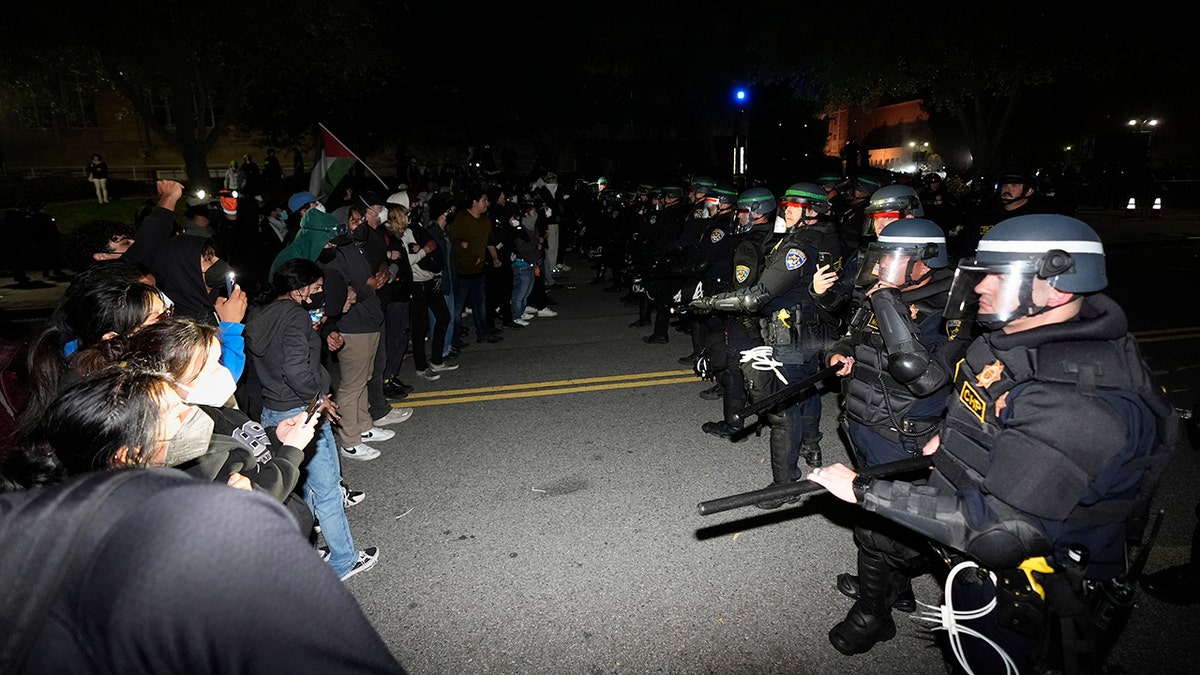 Protesters forming a line