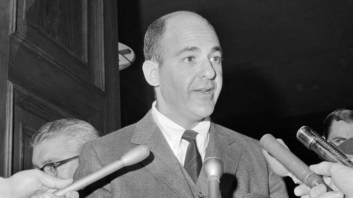Dr. Cyril Wecht of Pittsburgh, a witness during the hearings to exhume the body of Mary Jo Kopechne, speaks to reporters