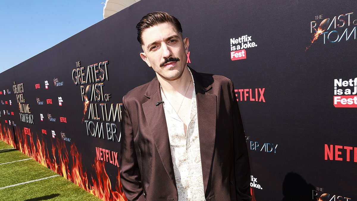 Andrew Schulz on red carpet