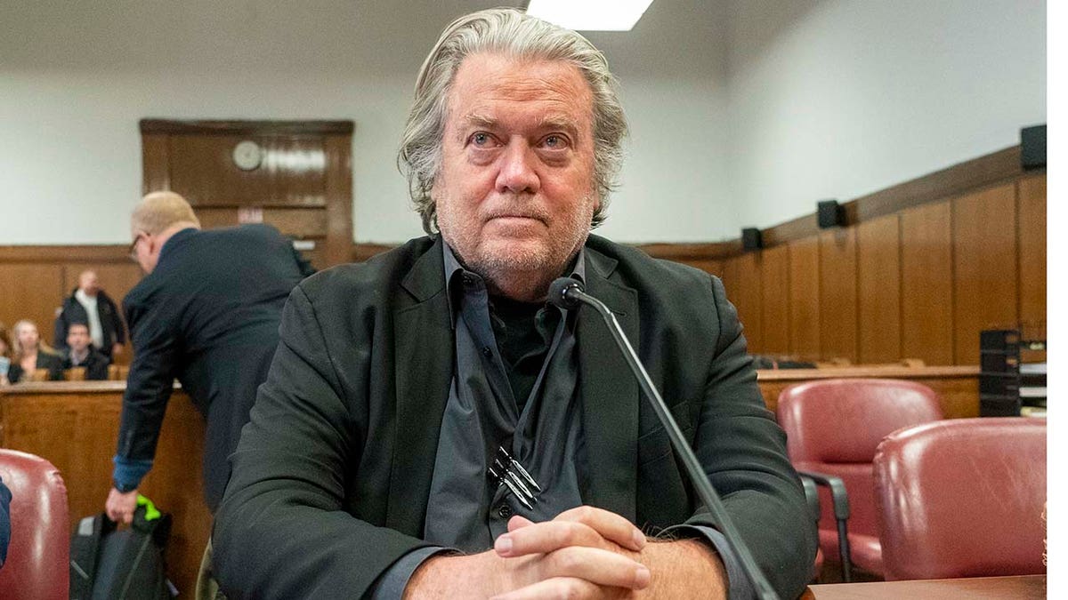 Steve Bannon in courtroom at defense table