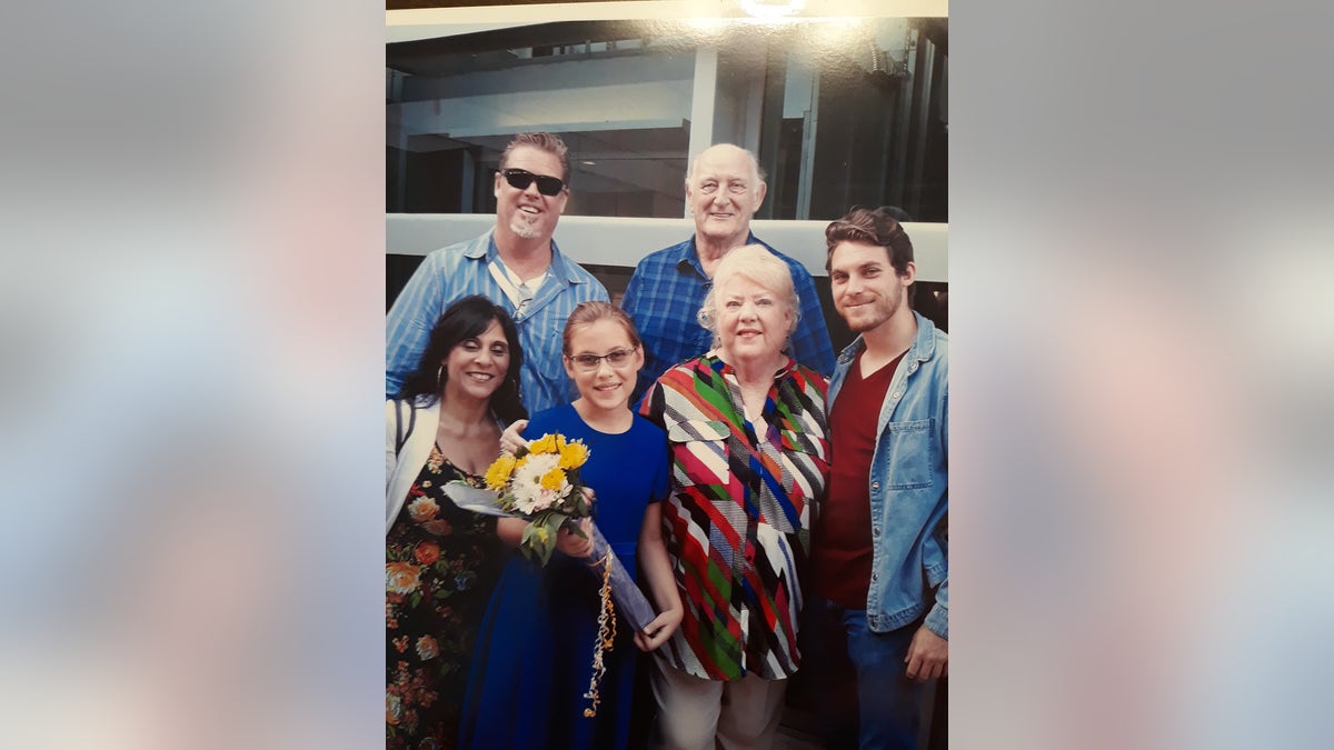 Barbara Mabee Abel surrounded by her family