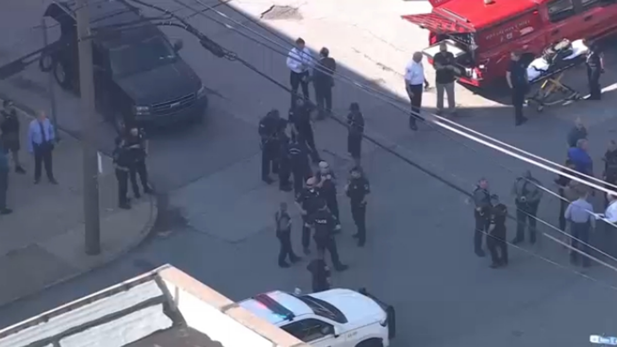 Police and first responders gather near the scene of the shooting Wednesday, May 22, in Chester, Pennsylvania. (WPVI) Shooting scene in Chester, Pennsylvania