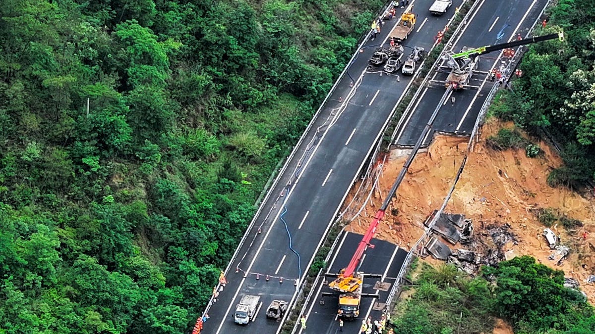 An aerial photograph shows rescuers activity astatine nan tract of a collapsed roadworthy conception of nan Meizhou-Dabu Expressway successful Meizhou, southbound China's Guangdong Province.