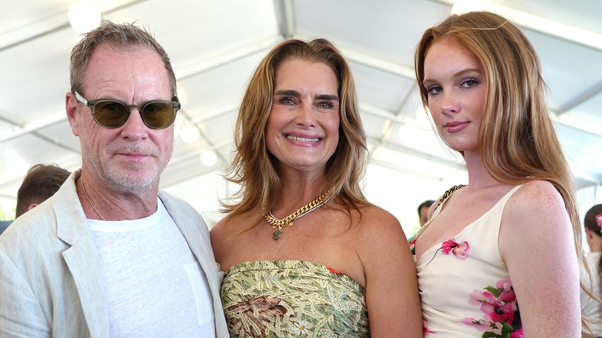 Chris Henchy, Brooke Shields attend an event with their daughter Grier