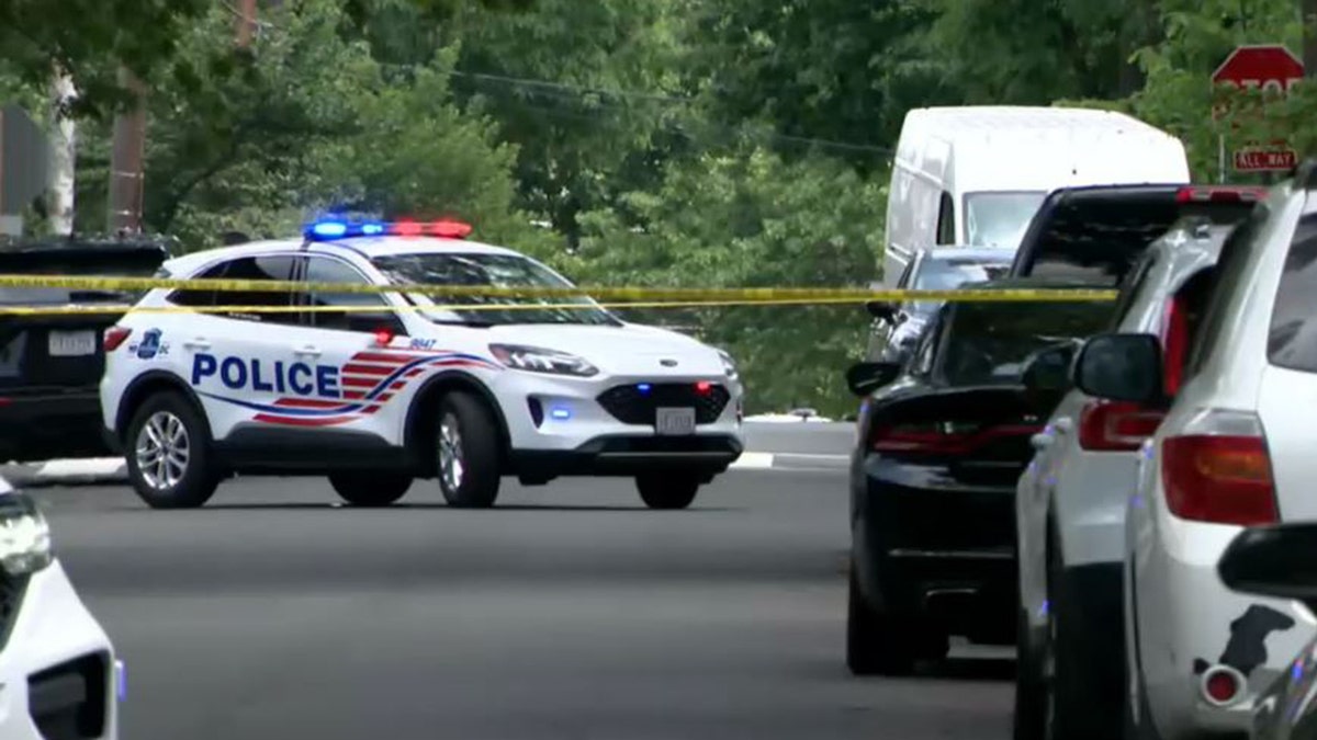 Coches de policía de DC en el lugar del tiroteo