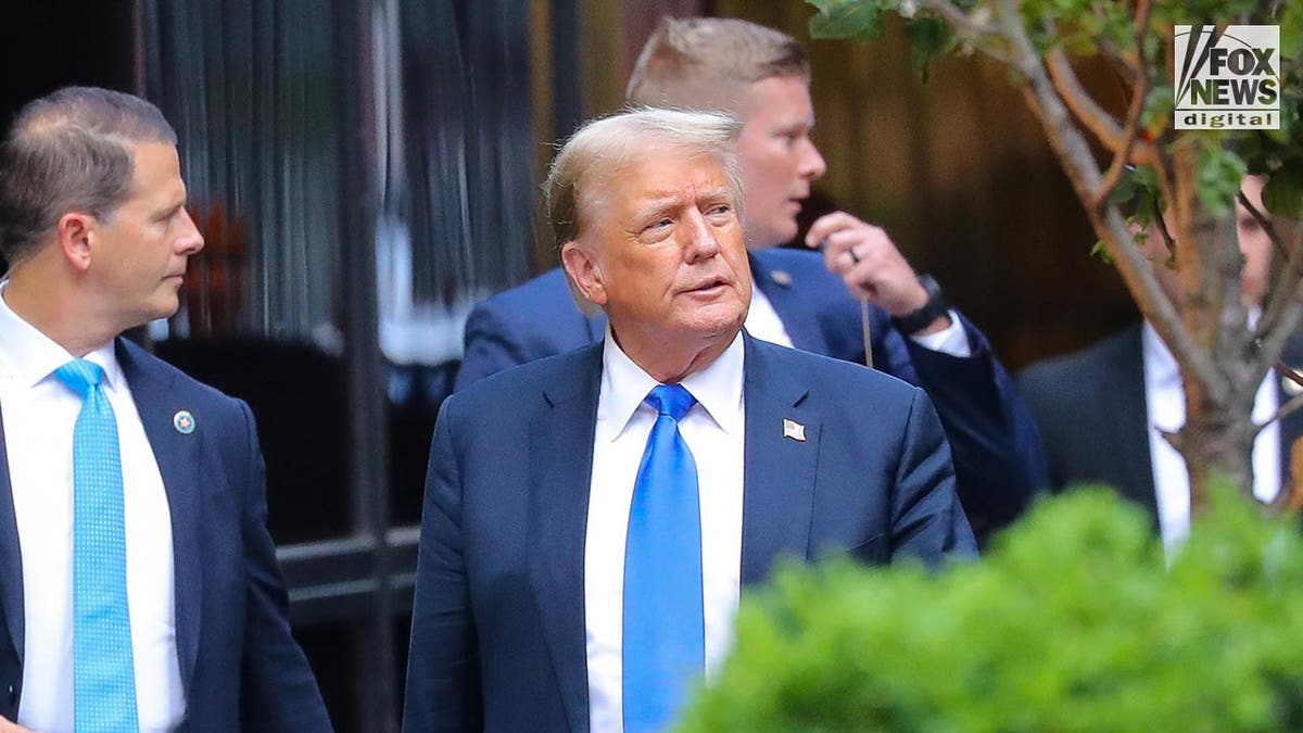Donald Trump arriving at Trump Tower 