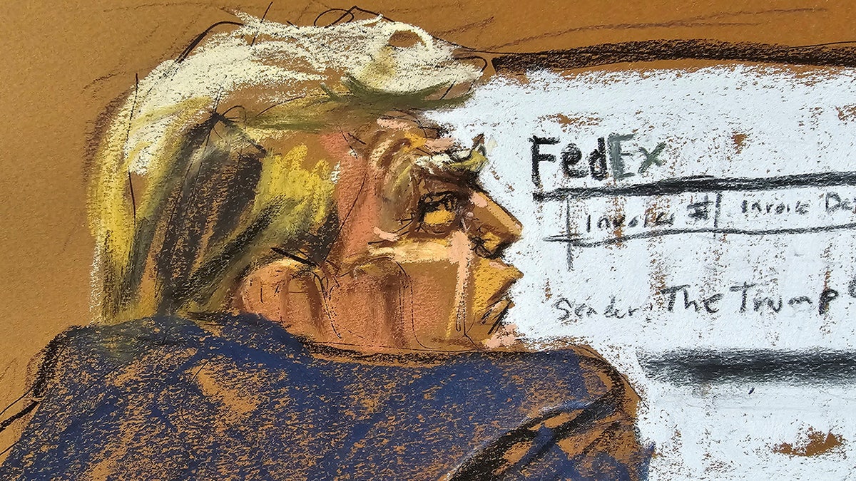 Former U.S. President Donald Trump sits in front of a FedEx sign during his criminal trial