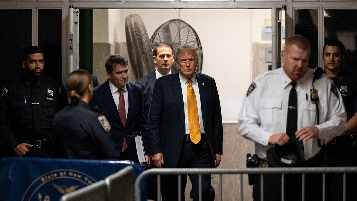 Donald Trump arriving at courthouse with attorneys