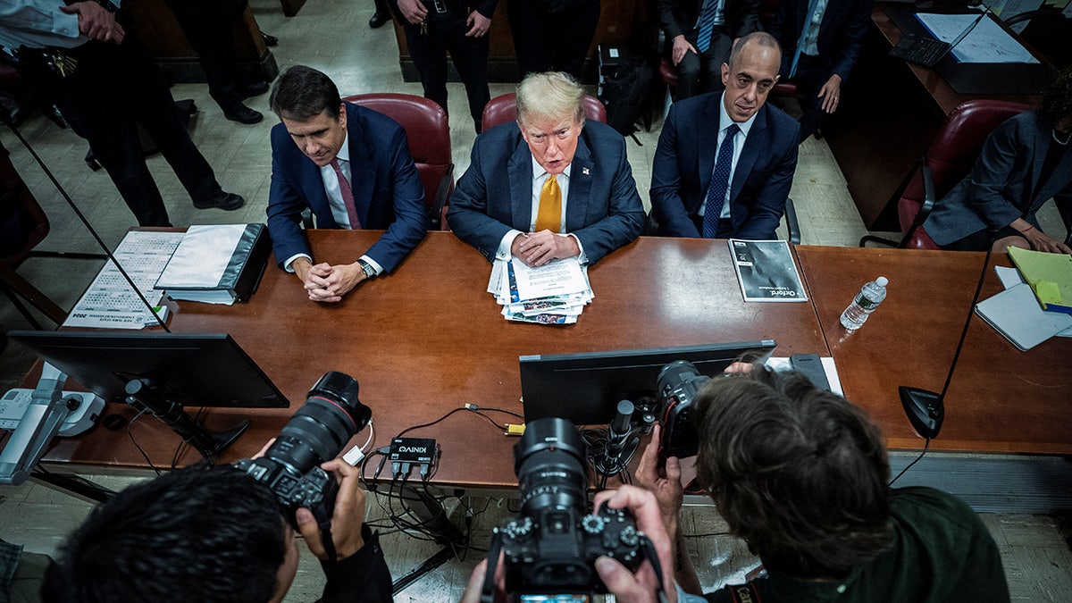 Donald Trump attends his criminal trial