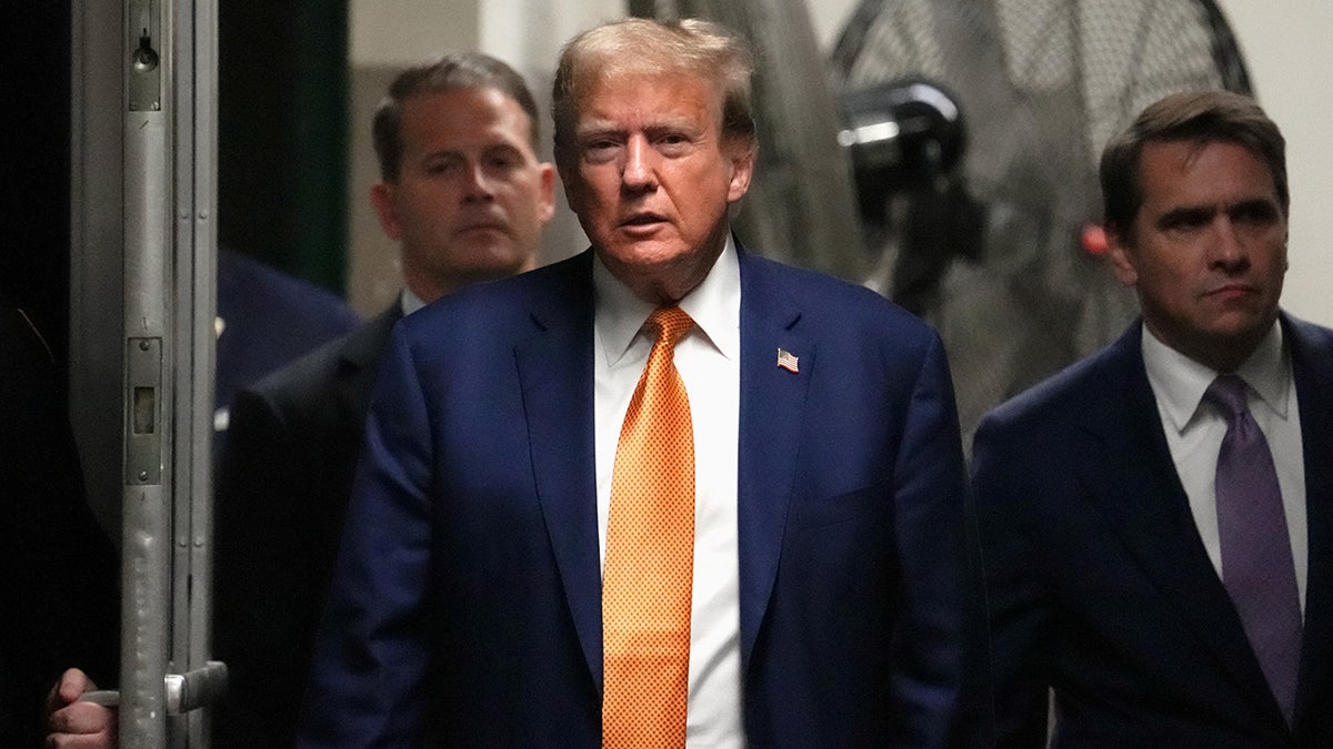 Donald Trump successful  courthouse hallway successful  orangish  tie