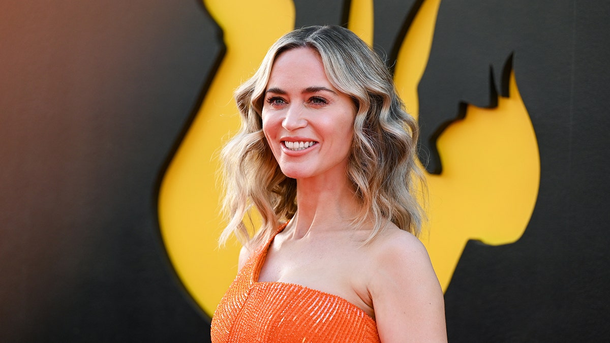 Emily Blunt smiling close up on the red carpet