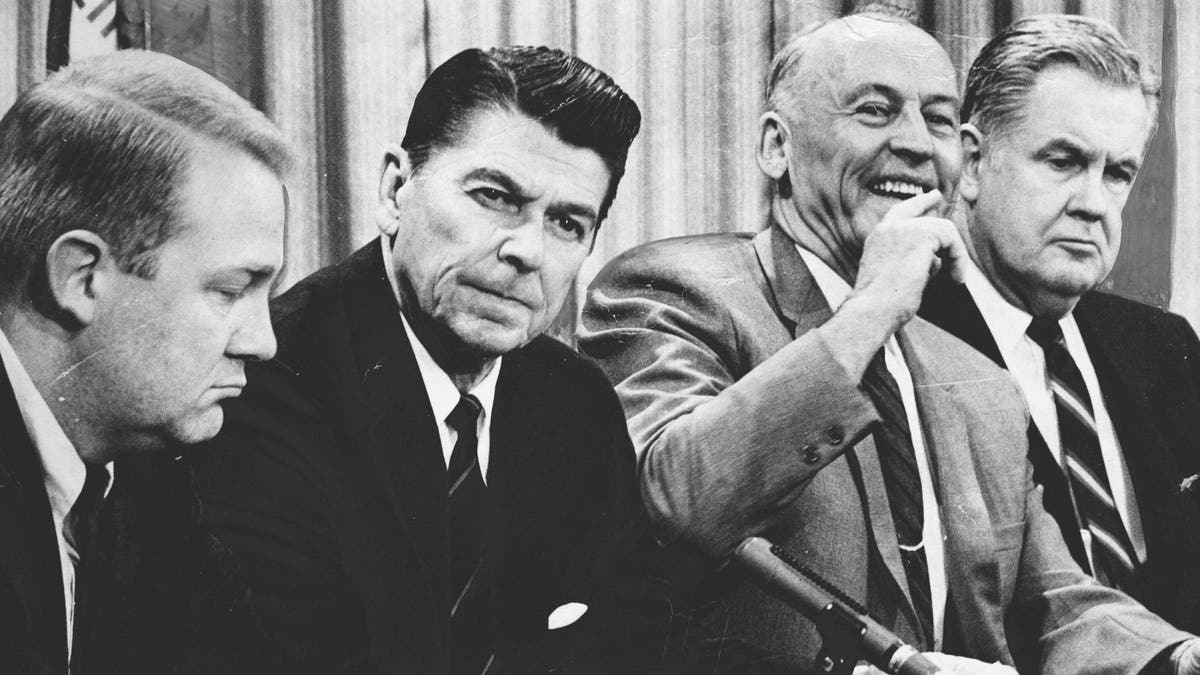 then-Gov. Ronald Reagan with Ed Meese to his left, other officials on his right in 1969 photo