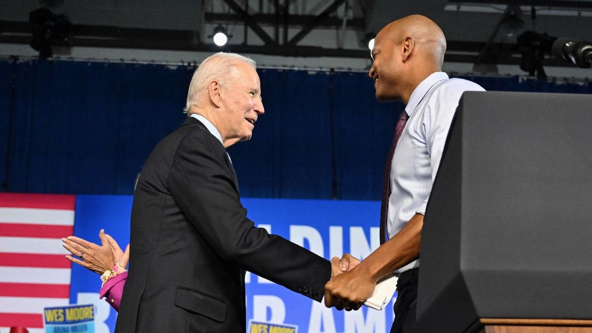 Biden shaking hands with Moore