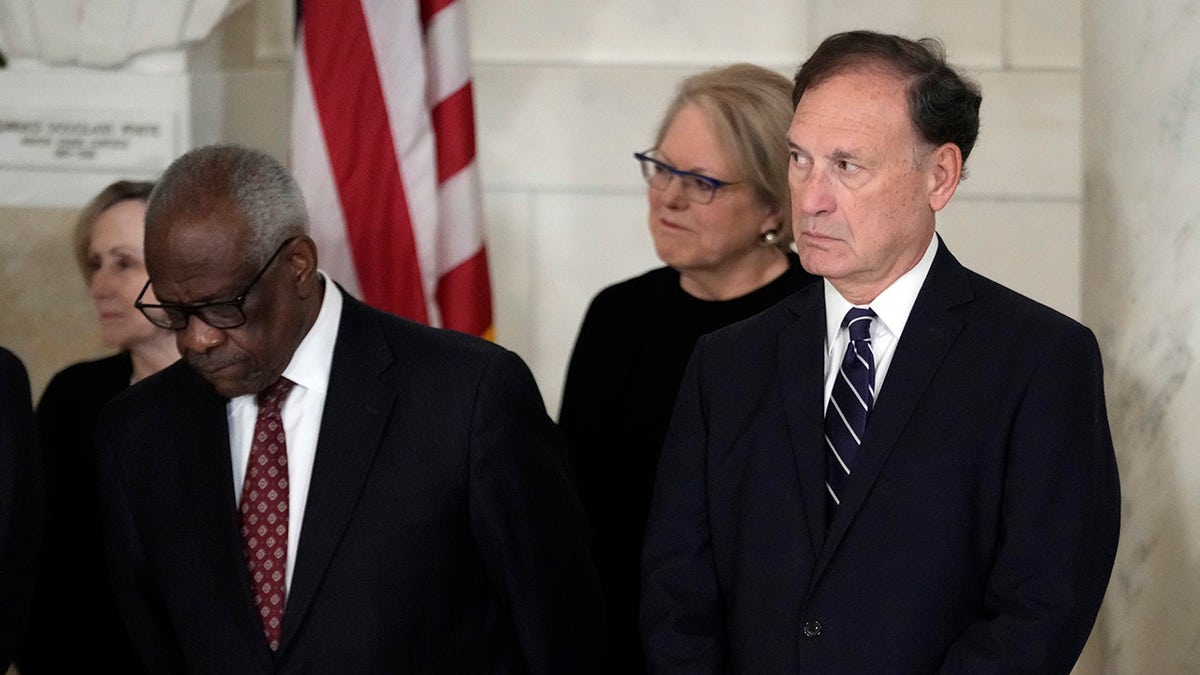Alito and Roberts sit at Sandra Day O'Connor's casket.