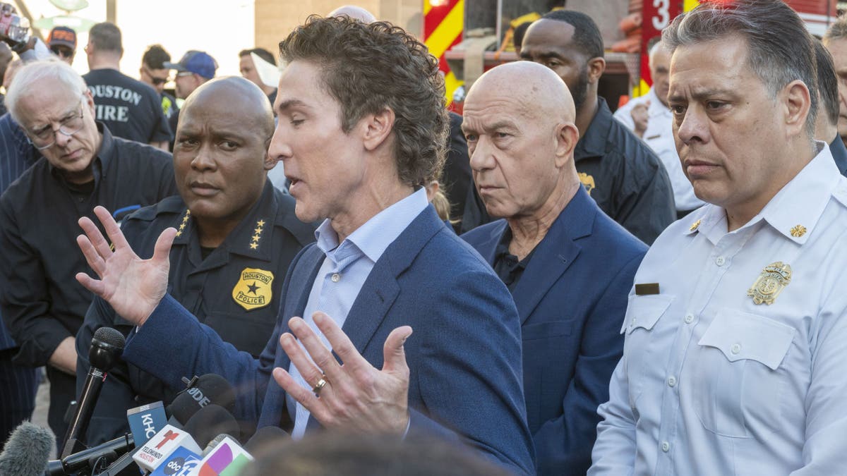 From left, Police Chief Troy Finner, Lakewood Church pastor Joel Osteen, Mayor John Whitmire and Fire Department Chief Samuel Pena,
