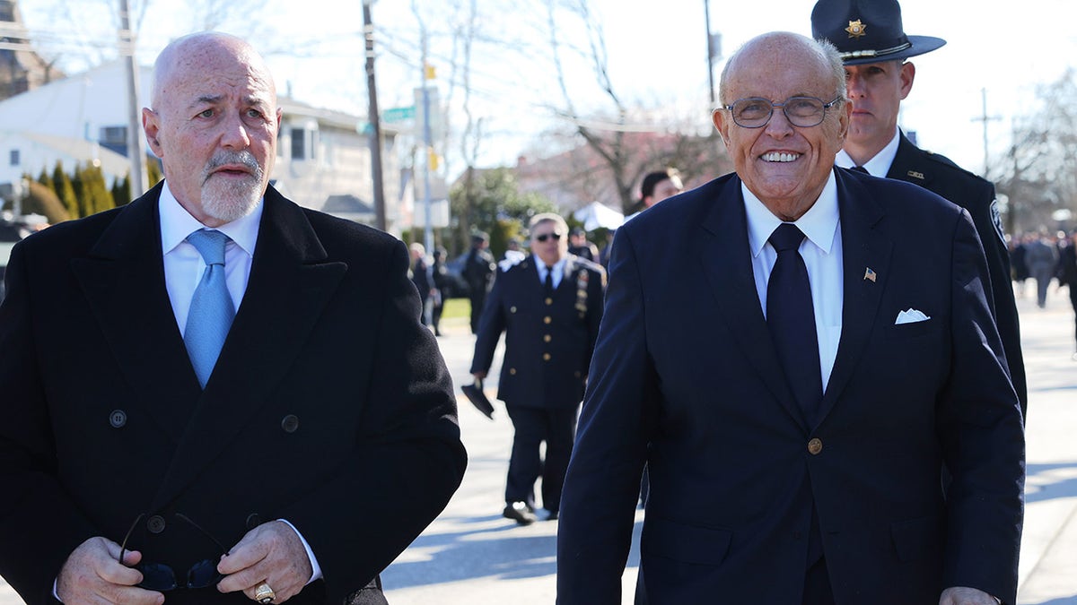 Giuliani at Long Island funeral for fallen NYPD officer