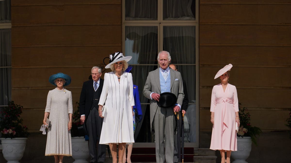 royal family posing at garden party