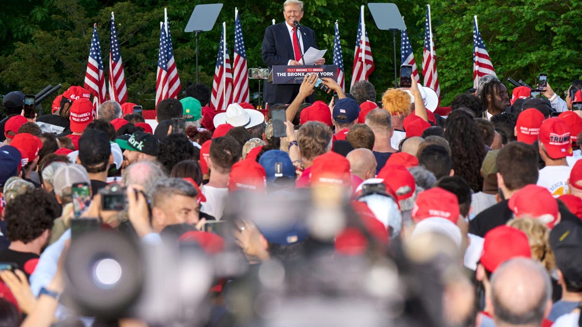 Former President Donald Trump, center, during a campaign event at Crotona Park in the Bronx borough of New York, US, on Thursday, May 23, 2024. Photographer: Bing Guan/Bloomberg via Getty Images