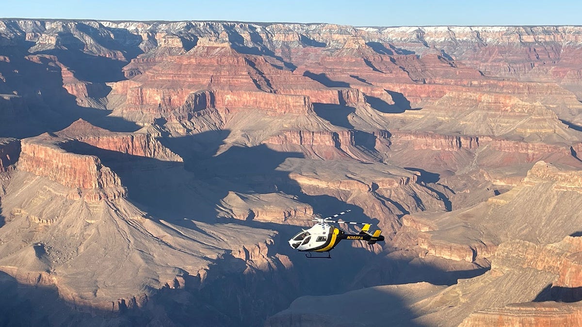 Helicopter flying over Grand Canyon